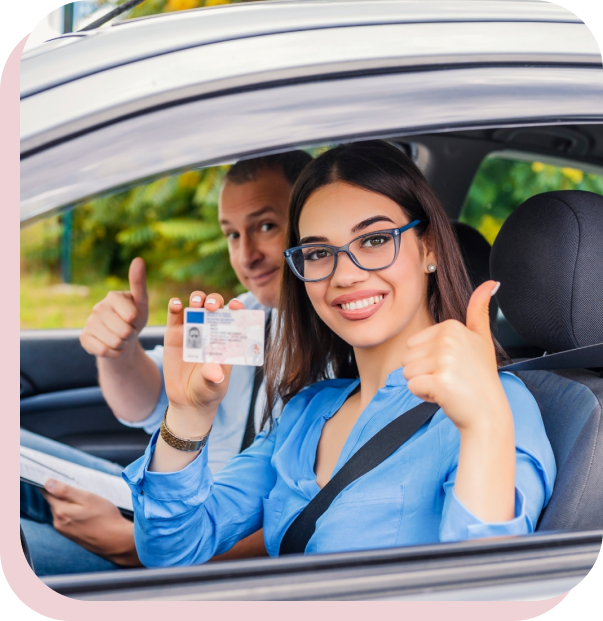 A woman and man in the drivers seat of a car.